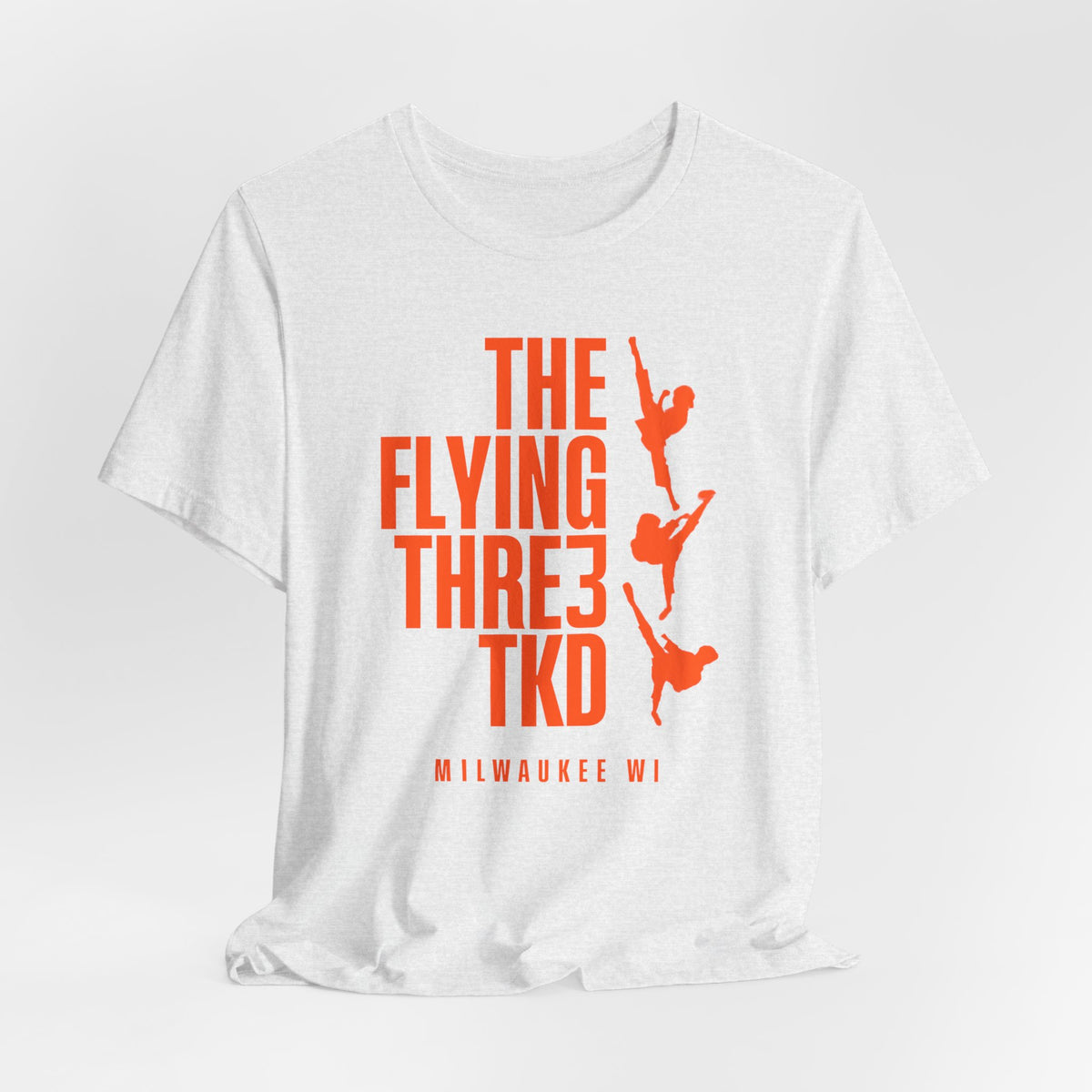 The Flying Three TKD Tee Solid Orange Logo