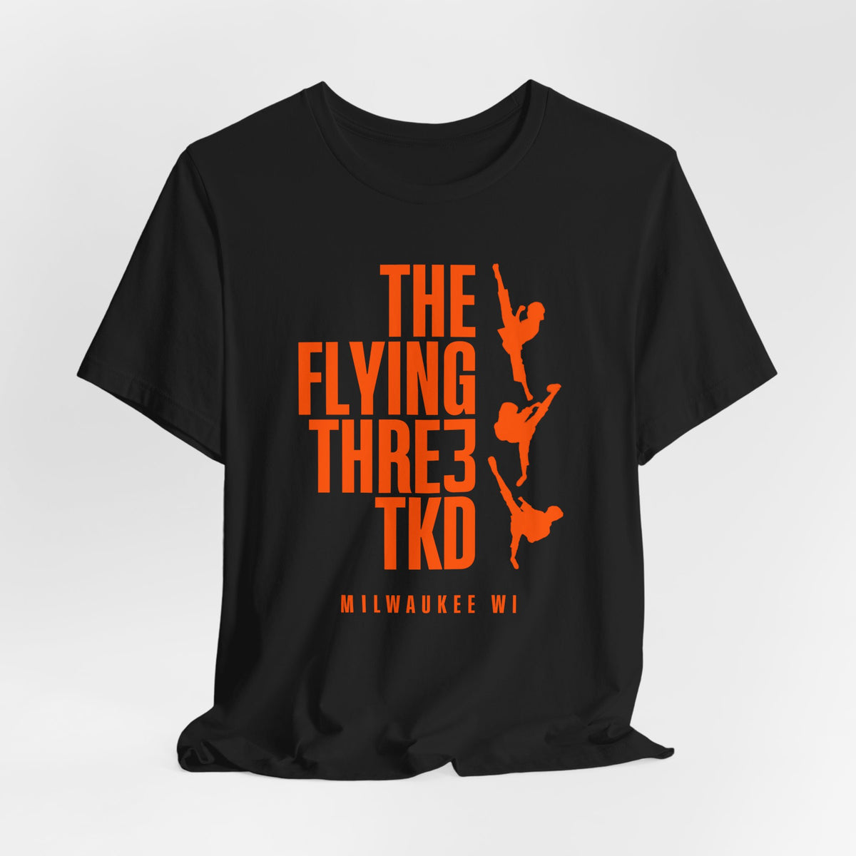 The Flying Three TKD Tee Solid Orange Logo